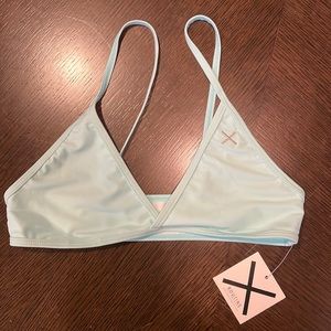 Boutine LA Womens bikini top. Unworn. New w tags. Unworn. Size Medium. Blue.